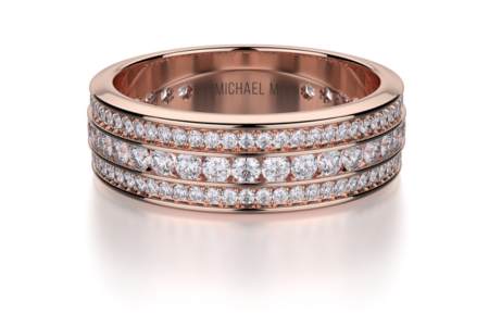 A glamorous three-row diamond and rose gold wedding band by Michael M, available at The Wedding Ring Shop.