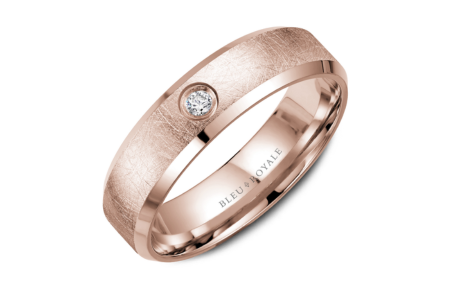 A textured rose gold men’s wedding band from Bleu Royale, available at The Wedding Ring Shop.